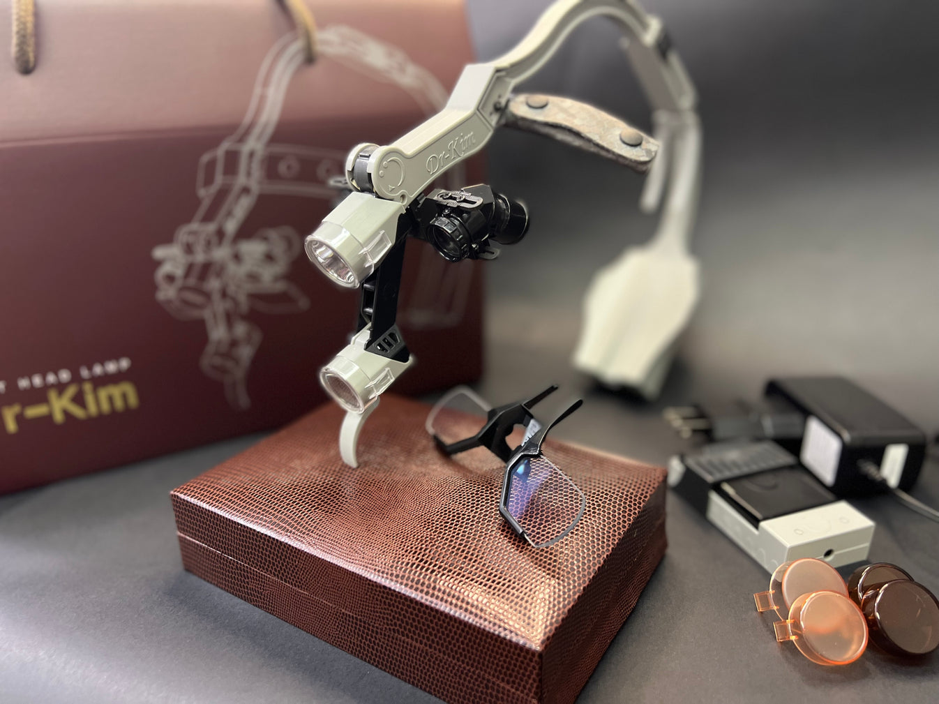 HEADLIGHT_ DKH60 TELESCOPES & LOUPE SET. The First dual magnification Dr Kim Headlight